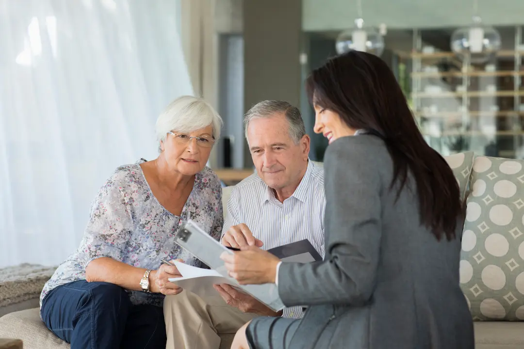 Retired Couple Receiving Wealth Management Portugal Advice